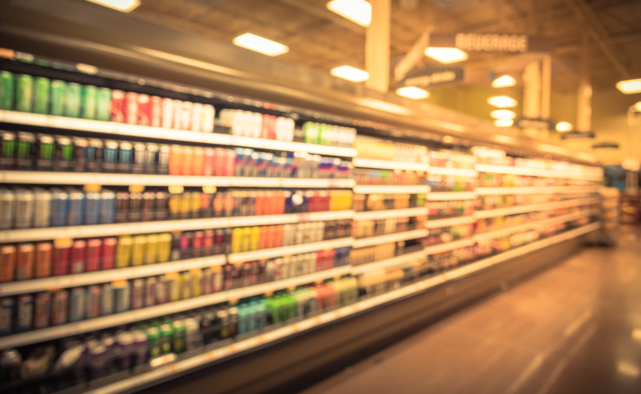 Blurred,Beverage,Display,On,Cold,Freezer,At,Local,Store,In